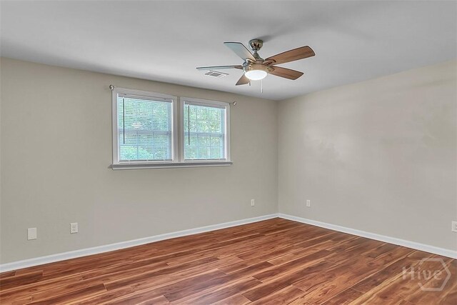 142 Bill Brown Rd, Pembroke, GA 31321 - spare room with wood finished floors and ceiling fan