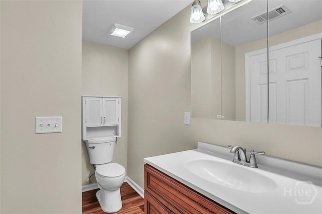 142 Bill Brown Rd, Pembroke, GA 31321 - bathroom featuring wood finished floors and vanity