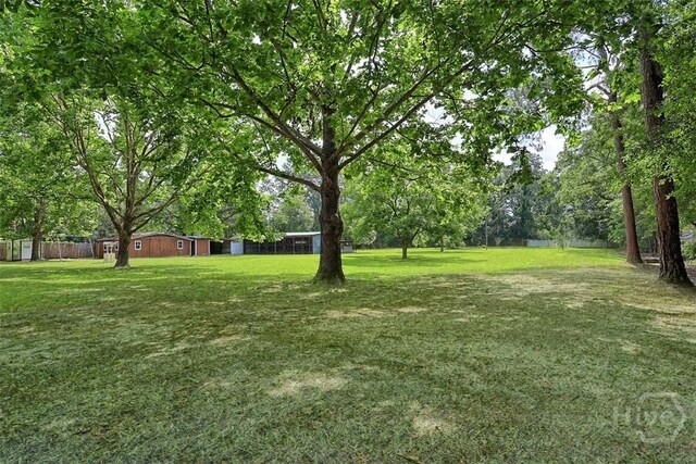 142 Bill Brown Rd, Pembroke, GA 31321 - view of yard with view of wooded area