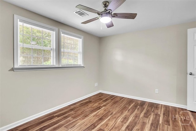 142 Bill Brown Rd, Pembroke, GA 31321 - unfurnished room with healthy amount of natural light, wood finished floors, and ceiling fan