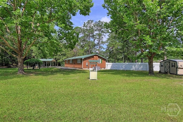 142 Bill Brown Rd, Pembroke, GA 31321 - view of yard with a storage shed and view of scattered trees