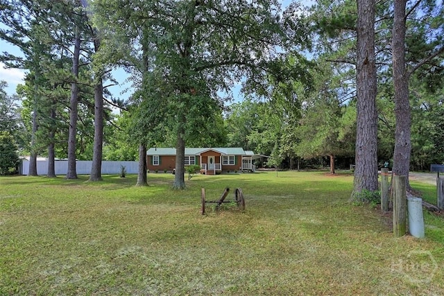 142 Bill Brown Rd, Pembroke, GA 31321 - view of yard featuring covered porch