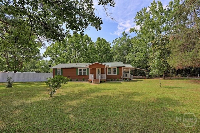 142 Bill Brown Rd, Pembroke, GA 31321 - single story home featuring a carport and a metal roof
