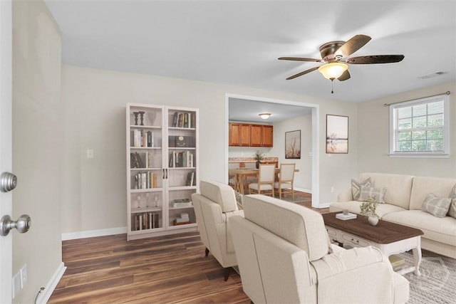 142 Bill Brown Rd, Pembroke, GA 31321 - living area featuring wood finished floors and ceiling fan