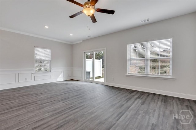 343 Governor Gwinnett Way, Pooler, GA 31322 - unfurnished living room featuring dark wood-type flooring, a wainscoted wall, ceiling fan, ornamental molding, and recessed lighting