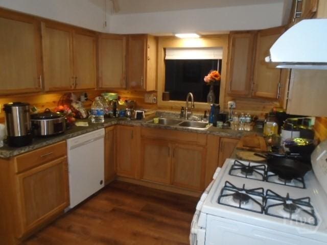 506 Mclaws St, Savannah, GA 31405 - kitchen with a sink, ventilation hood, white appliances, dark wood-type flooring, and brown cabinetry