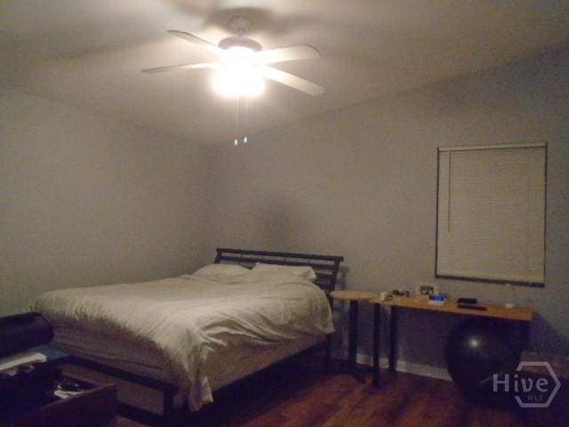 506 Mclaws St, Savannah, GA 31405 - bedroom with wood finished floors and a ceiling fan