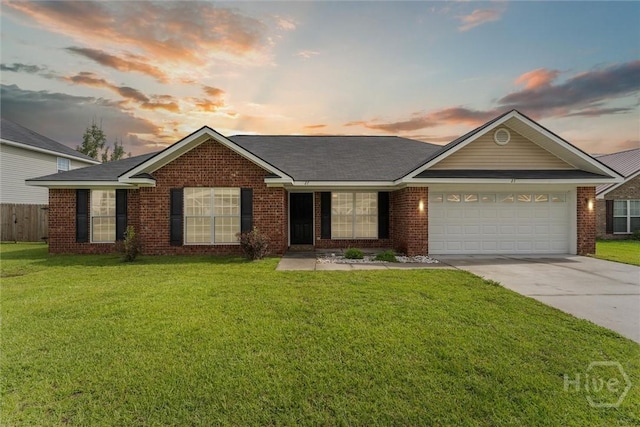 27 Drayton Ct, Midway, GA 31320 - ranch-style house featuring an attached garage, brick siding, and driveway