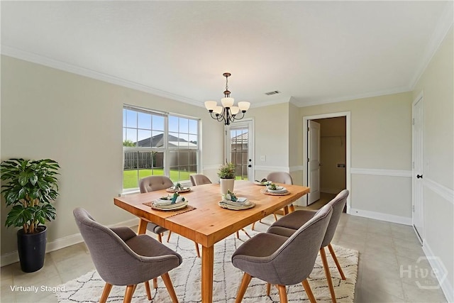 27 Drayton Ct, Midway, GA 31320 - dining room with a chandelier, crown molding, and baseboards
