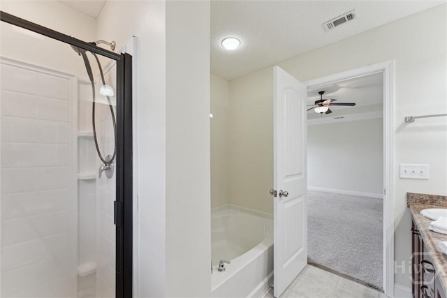 27 Drayton Ct, Midway, GA 31320 - bathroom with a shower, vanity, a ceiling fan, baseboards, and a tub to relax in