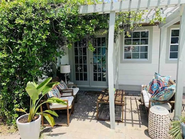 1810 Chatham Ave, Tybee Island, GA 31328 - view of patio with french doors, a pergola, and an outdoor living space