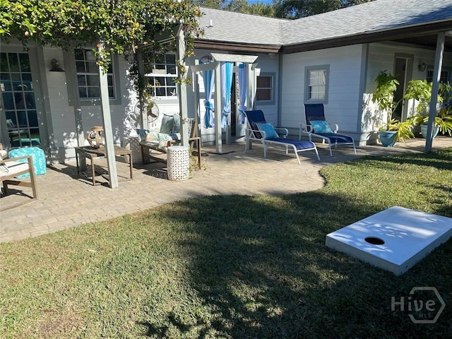 1810 Chatham Ave, Tybee Island, GA 31328 - view of grassy yard with a patio