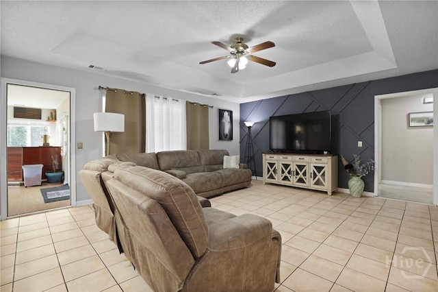 1346 Ryans Way, Pooler, GA 31322 - living room with a raised ceiling, light tile patterned flooring, ceiling fan, and baseboards