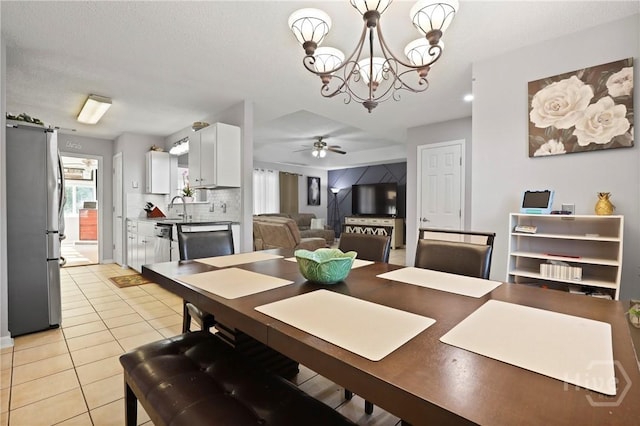 1346 Ryans Way, Pooler, GA 31322 - dining space with light tile patterned flooring, a ceiling fan, and a chandelier