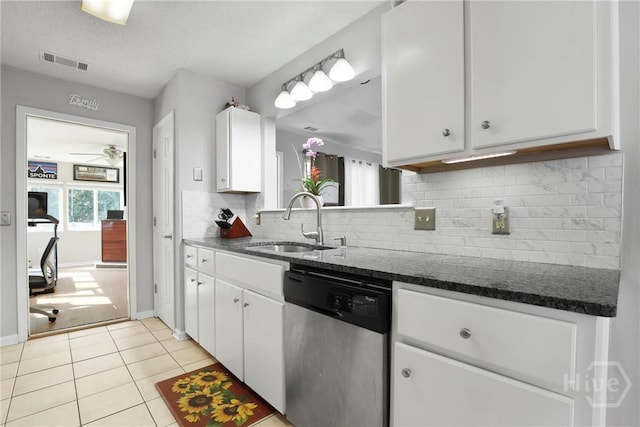 1346 Ryans Way, Pooler, GA 31322 - kitchen featuring stainless steel dishwasher, a sink, white cabinetry, tasteful backsplash, and light tile patterned floors
