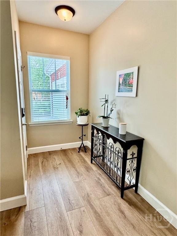 174 Regency Cir, Pooler, GA 31322 - doorway to outside with wood finished floors and baseboards