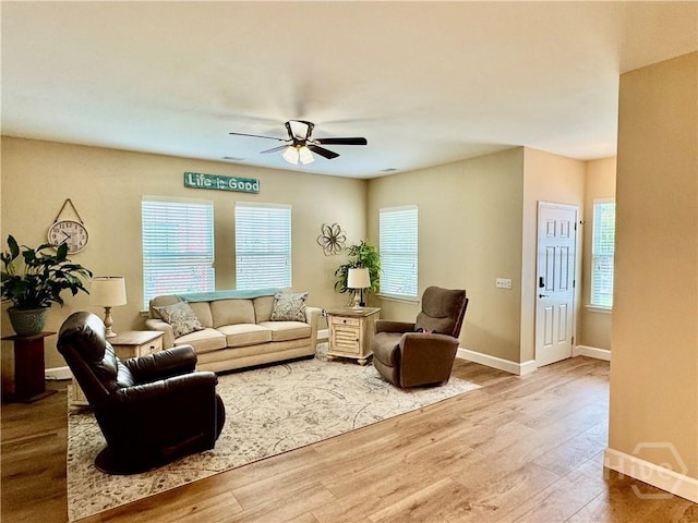 174 Regency Cir, Pooler, GA 31322 - living area with wood finished floors, ceiling fan, and baseboards