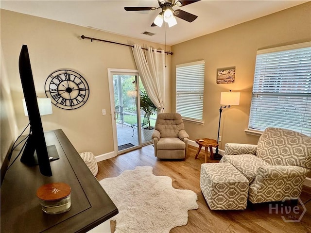 174 Regency Cir, Pooler, GA 31322 - sitting room featuring baseboards, a ceiling fan, and wood finished floors