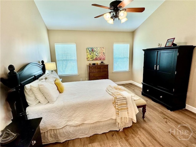 174 Regency Cir, Pooler, GA 31322 - bedroom with wood finished floors, baseboards, and a ceiling fan