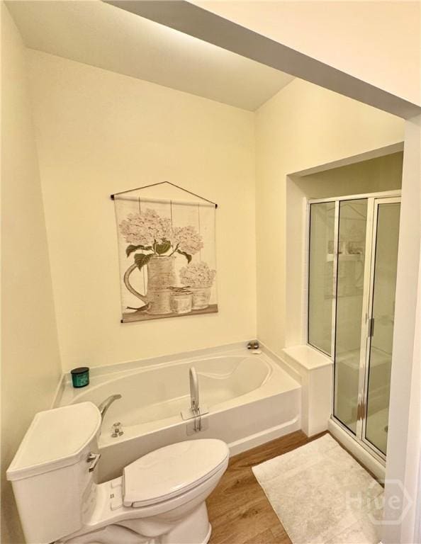 174 Regency Cir, Pooler, GA 31322 - bathroom featuring toilet, a bath, a shower stall, and wood finished floors
