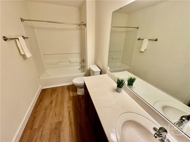 174 Regency Cir, Pooler, GA 31322 - full bath featuring wood finished floors, toilet, vanity, bathtub / shower combination, and baseboards