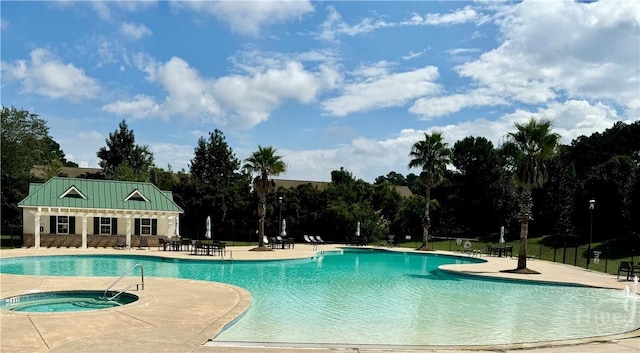 174 Regency Cir, Pooler, GA 31322 - community pool with a patio, view of wooded area, and a hot tub