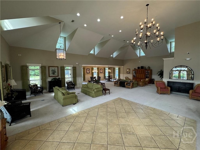 174 Regency Cir, Pooler, GA 31322 - living area with carpet floors, high vaulted ceiling, a chandelier, healthy amount of natural light, and recessed lighting
