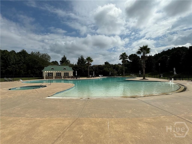 174 Regency Cir, Pooler, GA 31322 - community pool with a patio area