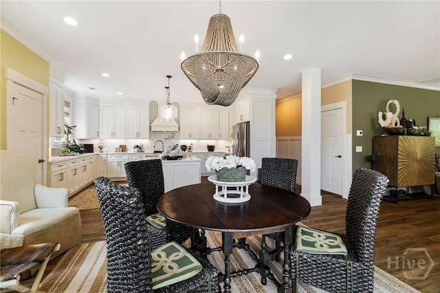 122 N St, Savannah, GA 31410 - dining area featuring wood finished floors, a chandelier, ornamental molding, and recessed lighting