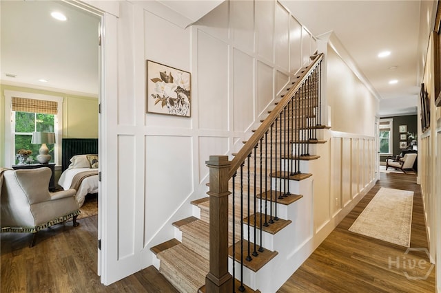 122 N St, Savannah, GA 31410 - staircase featuring a decorative wall, wood finished floors, recessed lighting, and crown molding
