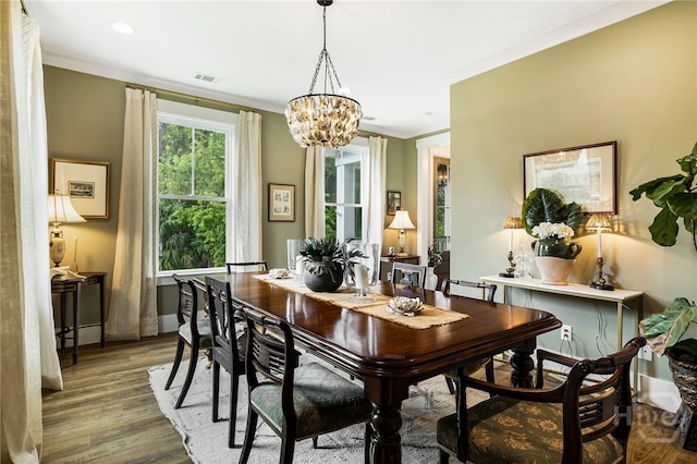122 N St, Savannah, GA 31410 - dining room featuring a chandelier, wood finished floors, ornamental molding, baseboards, and recessed lighting
