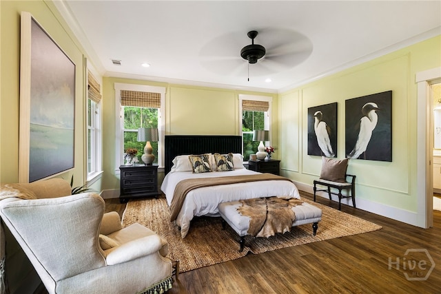 122 N St, Savannah, GA 31410 - bedroom featuring multiple windows, ornamental molding, wood finished floors, a ceiling fan, and baseboards