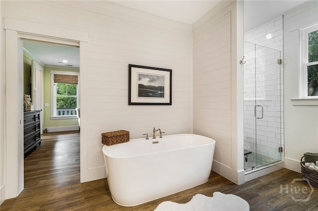 122 N St, Savannah, GA 31410 - bathroom with wood finished floors, a freestanding tub, and a shower stall