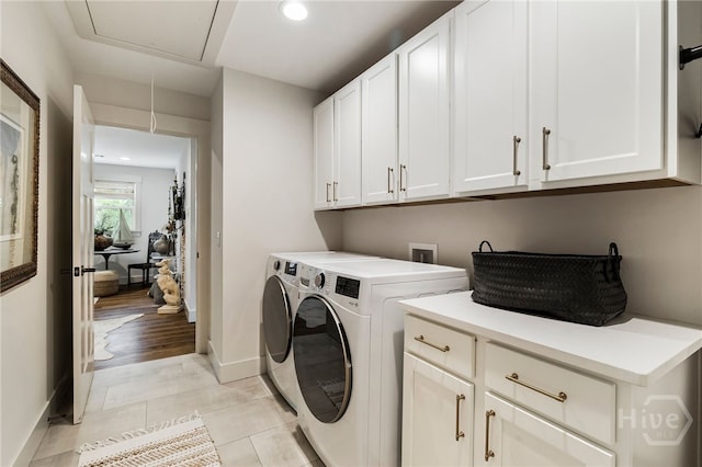 122 N St, Savannah, GA 31410 - washroom with attic access, cabinet space, washer and dryer, recessed lighting, and baseboards