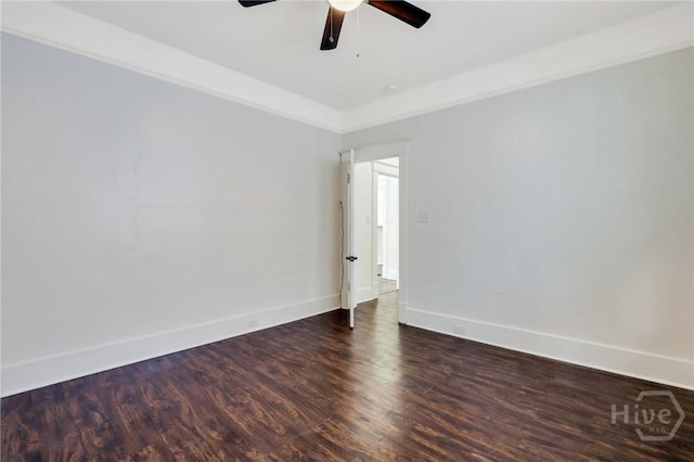 521 Seiler Ave, Savannah, GA 31401 - unfurnished room with dark wood-style flooring, a ceiling fan, and baseboards