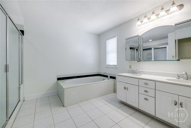 1 Shipyard Ln, Savannah, GA 31406 - bathroom with double vanity, a bath, tile patterned flooring, a textured ceiling, and a stall shower