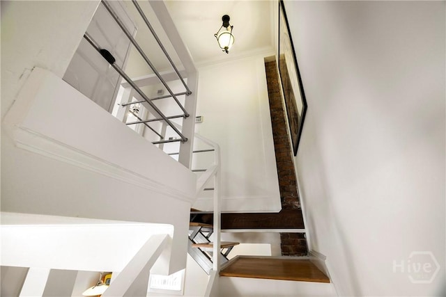 1402 Jefferson St, Savannah, GA 31401 - stairs with ornamental molding and a high ceiling