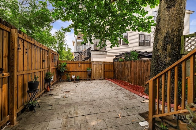 1402 Jefferson St, Savannah, GA 31401 - fenced backyard with a patio and a gate