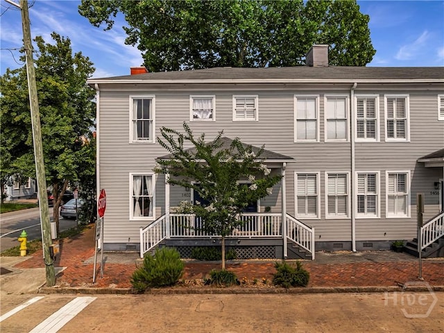 1402 Jefferson St, Savannah, GA 31401 - view of front of property featuring crawl space, a chimney, and stairway