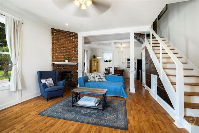 1402 Jefferson St, Savannah, GA 31401 - living room featuring ceiling fan, wood finished floors, and plenty of natural light