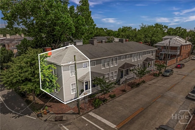 1402 Jefferson St, Savannah, GA 31401 - aerial view of property and surrounding area with property boundaries highlighted and a tree filled landscape