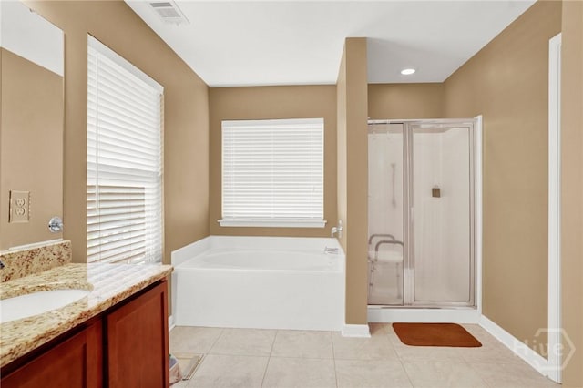 133 Moonlight Trl, Port Wentworth, GA 31407 - full bath with vanity, a stall shower, a garden tub, tile patterned floors, and baseboards