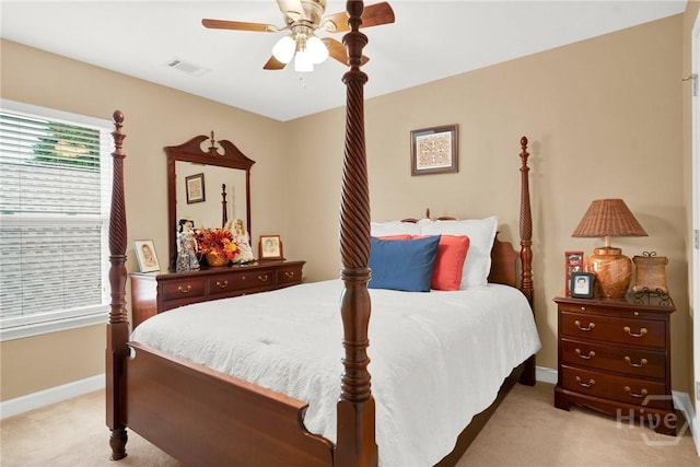 133 Moonlight Trl, Port Wentworth, GA 31407 - bedroom with light colored carpet, baseboards, and ceiling fan