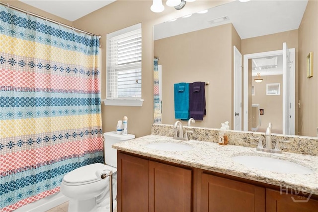 133 Moonlight Trl, Port Wentworth, GA 31407 - full bathroom with toilet, double vanity, curtained shower, and tile patterned floors