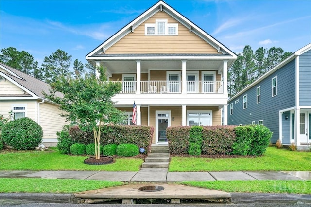 133 Moonlight Trl, Port Wentworth, GA 31407 - view of front facade featuring a balcony, covered porch, and a front yard