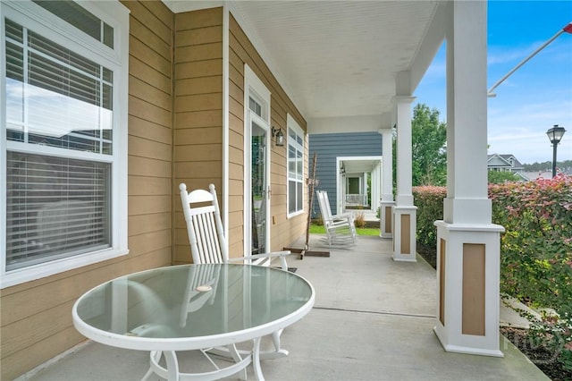 133 Moonlight Trl, Port Wentworth, GA 31407 - porch featuring outdoor dining space