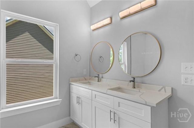 220 N Skinner Ave, Pooler, GA 31322 - full bathroom with double vanity, baseboards, and a wall mounted AC