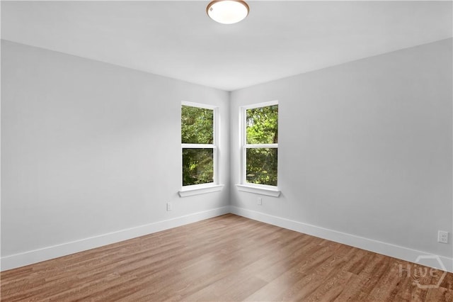 220 N Skinner Ave, Pooler, GA 31322 - unfurnished room with baseboards and wood finished floors