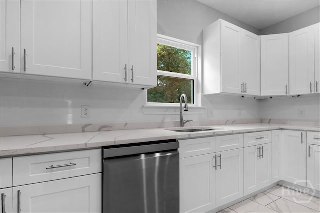 220 N Skinner Ave, Pooler, GA 31322 - kitchen featuring dishwasher, a sink, white cabinets, light marble finish flooring, and light stone countertops