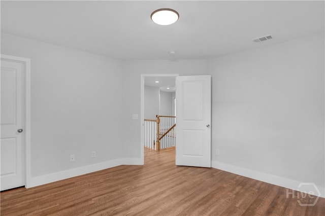 220 N Skinner Ave, Pooler, GA 31322 - empty room with baseboards and wood finished floors